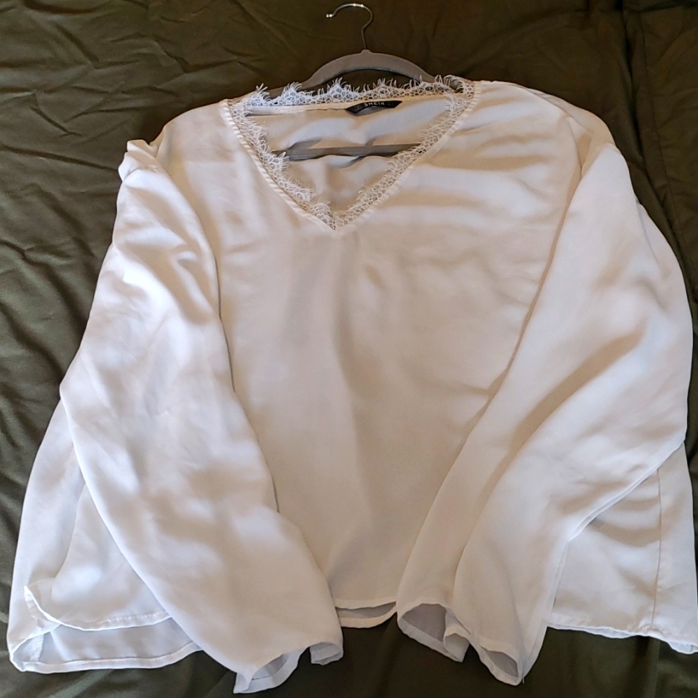 Shein white blouse with lace detailing on neck.
